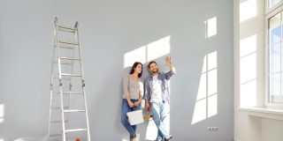 Young couple thinking about improvements they can make without violating their rental contract - Cheap renters insurance