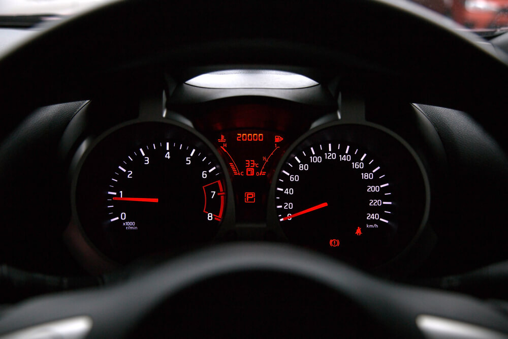 Car odometer displaying a total of 20,000 km
