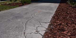 Cracked sunken concrete driveway repair - Acceptance, cheap business insurance