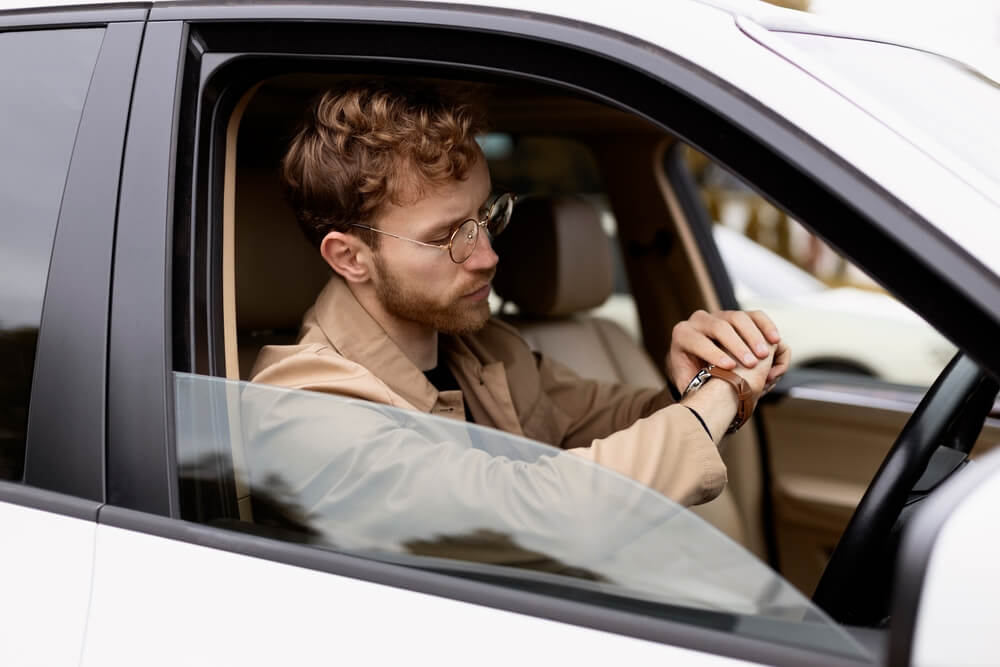 Person looking at his watch