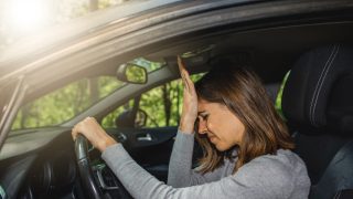 Woman is frustrated after getting in a wreck with no insurance.