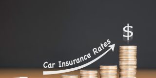 Increasing stacks of coins with a car at the beginning and an arrow going up, concept of increasing car insurance prices - cheap car insurance in California.