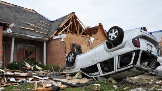 Car flipped over after a tornado.