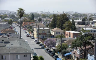 Misty morning light shines on downtown Richmond, California, USA – Richmond, cheap car insurance in California