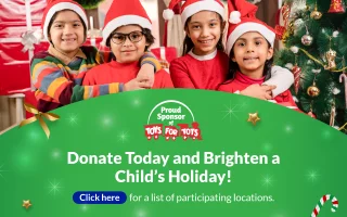 Banner with a group of children holding gifts and 'Proud Sponsor of Toys for Tots' logo.